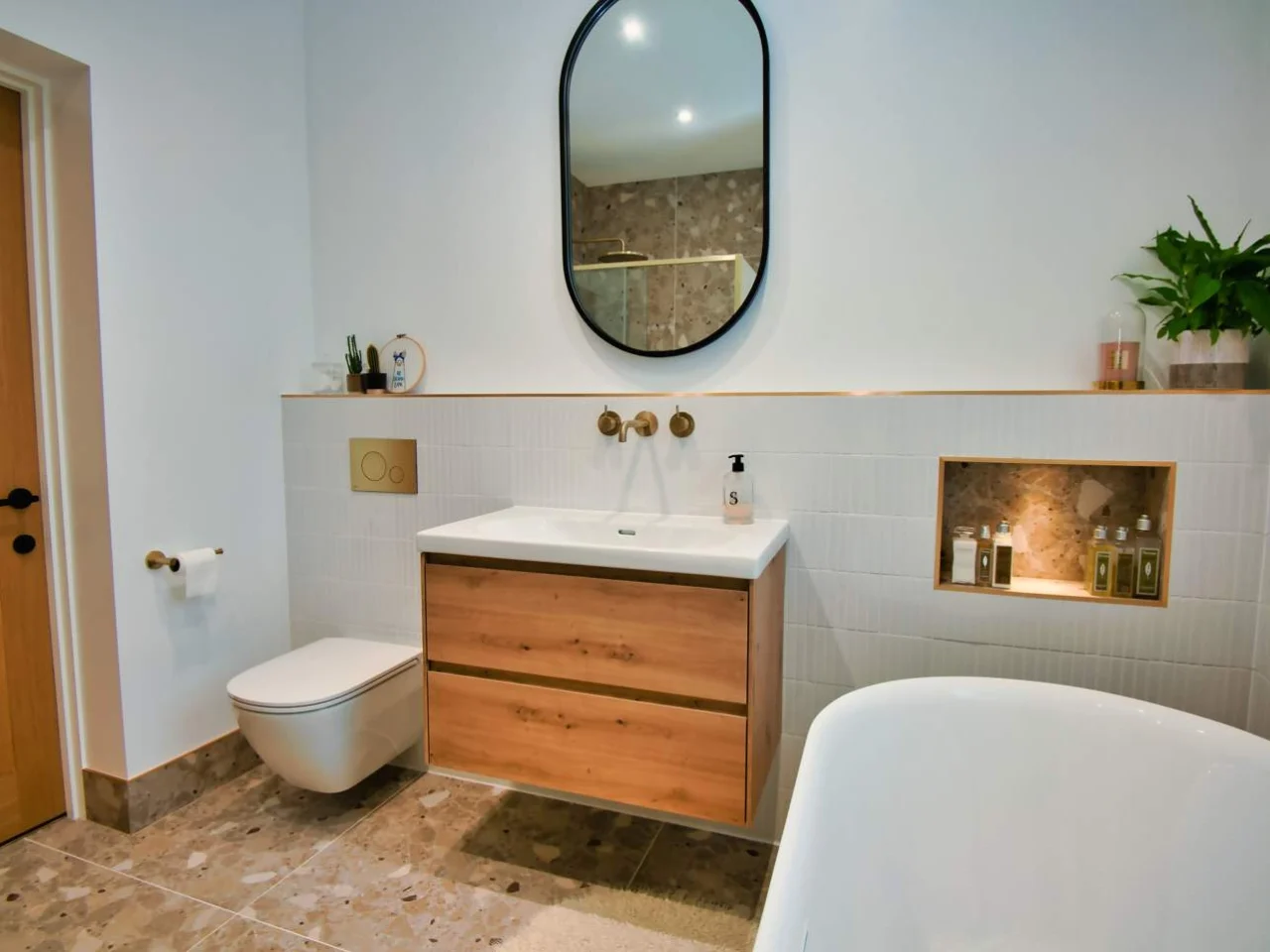 Bathroom vanity units and basin in a finished refit
