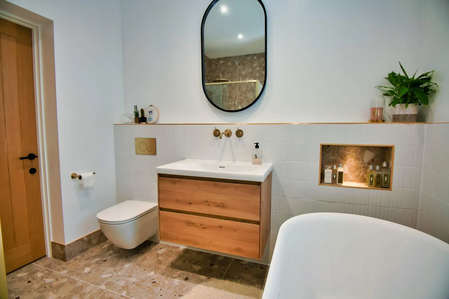 Fitted bathroom cabinets and basin after refurbishment