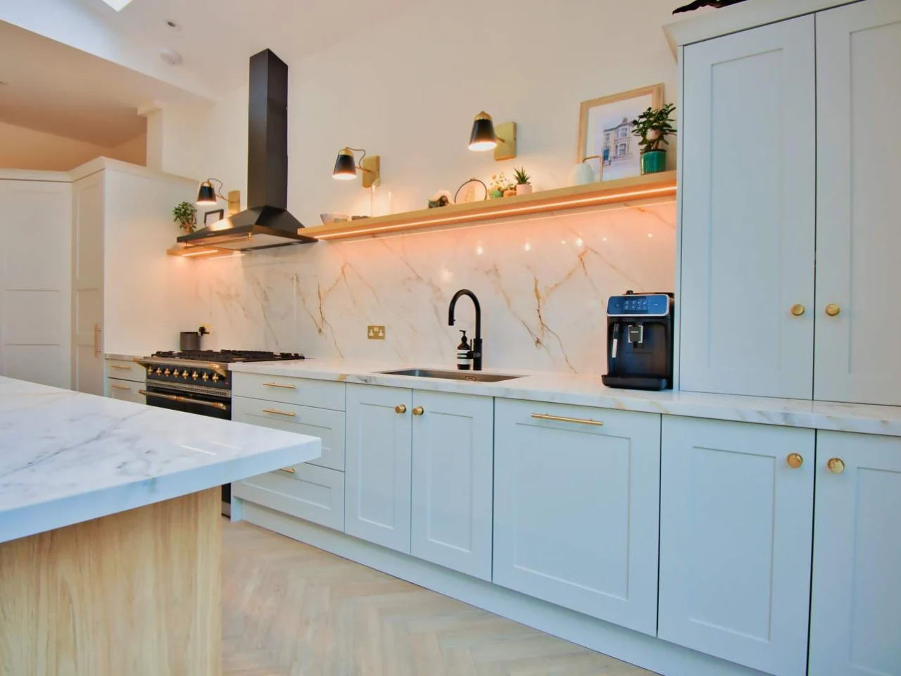 White kitchen units and worktop in a finished extension