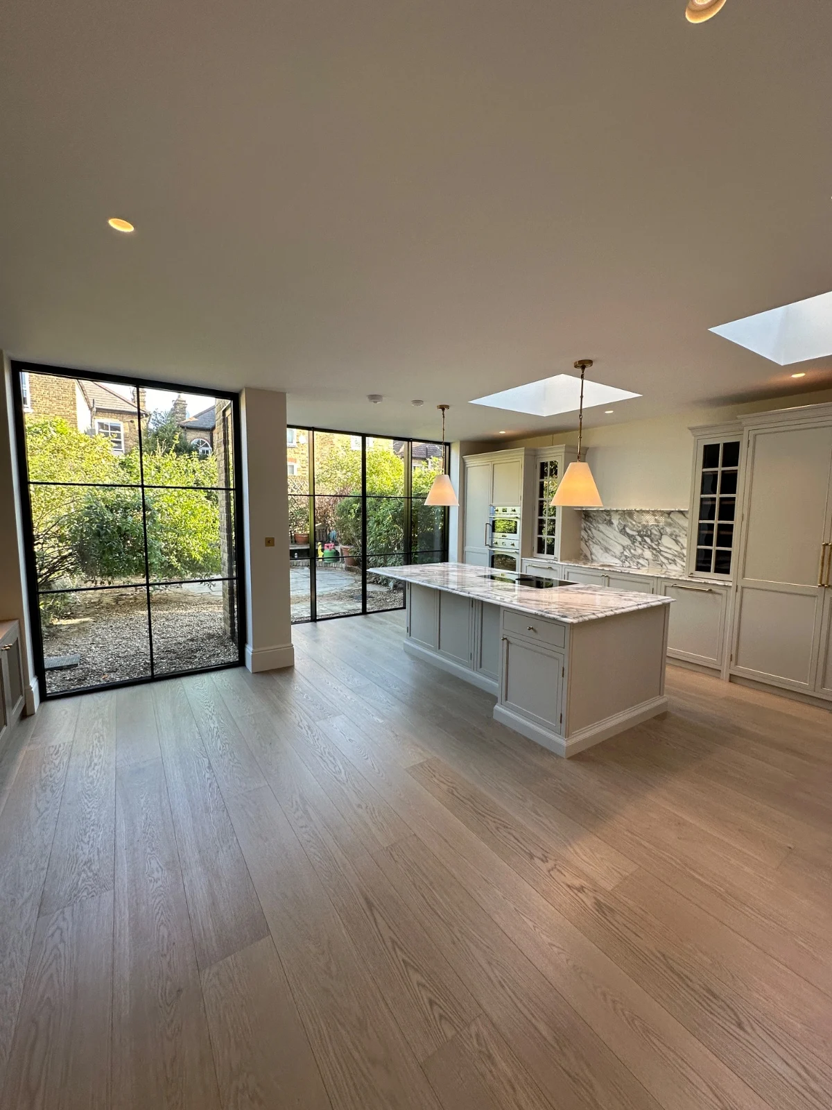A side return extension transforms a narrow galley kitchen into an open-plan kitchen-diner — the single most desirable layout in the 2026 London market.