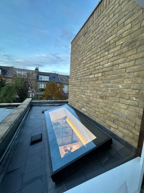 A rooflight detail on a finished loft conversion — natural light planning is one of the lines where premium specification quickly pays back in daily liveability.